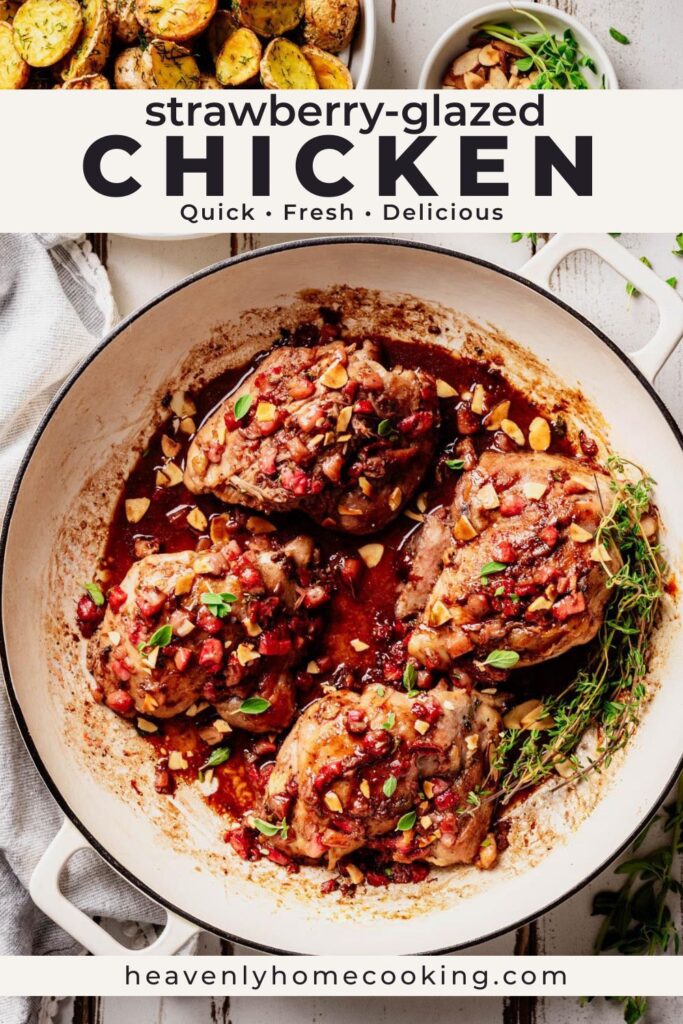 Overhead view of strawberry-glazed chicken thighs in a white skillet with a sweet and savory strawberry sauce, fresh herbs, and chopped nuts. Vertical Pinterest pin for a quick summer chicken dinner recipe from Heavenly Home Cooking.