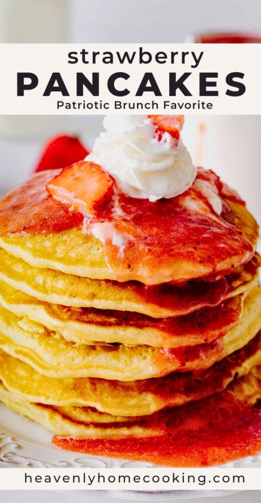 Stack of fluffy strawberry pancakes topped with strawberry sauce, whipped cream, and fresh strawberries on a white plate. Vertical Pinterest pin for strawberry pancakes and a patriotic brunch recipe from Heavenly Home Cooking.