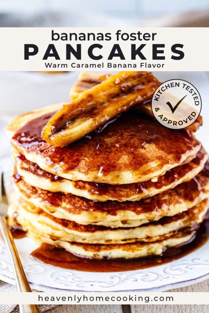 A stack of fluffy Bananas Foster pancakes topped with warm caramelized bananas and a rich brown sugar sauce, served on a white plate. This vertical Pinterest pin features a homemade Bananas Foster pancakes recipe from Heavenly Home Cooking.