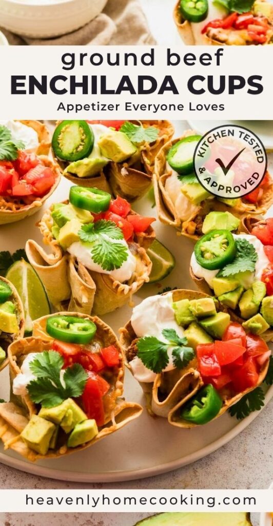 Ground beef enchilada cups made with baked tortillas and filled with seasoned beef, melted cheese, avocado, sour cream, jalapeño slices, diced tomatoes, and fresh cilantro. Vertical Pinterest pin for an easy appetizer recipe from Heavenly Home Cooking.