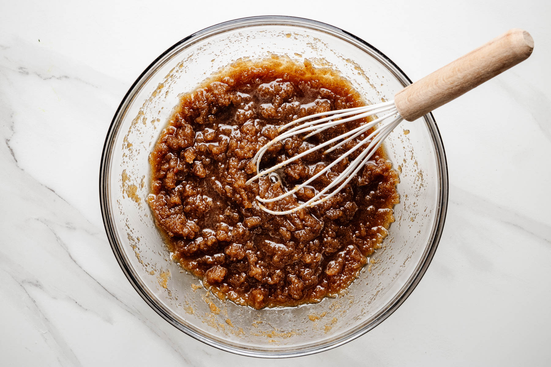 Browned butter and sugars whisked together into a coarse mixture for blondie batter.
