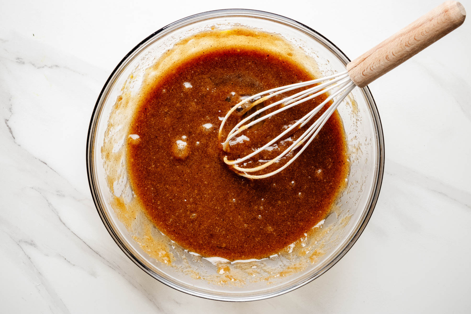 Brown butter, sugar, eggs, and vanilla whisked together until smooth and glossy.