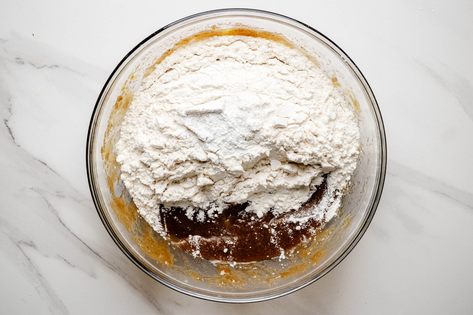 Flour, baking powder, and salt added to the wet ingredients for fireworks blondies.