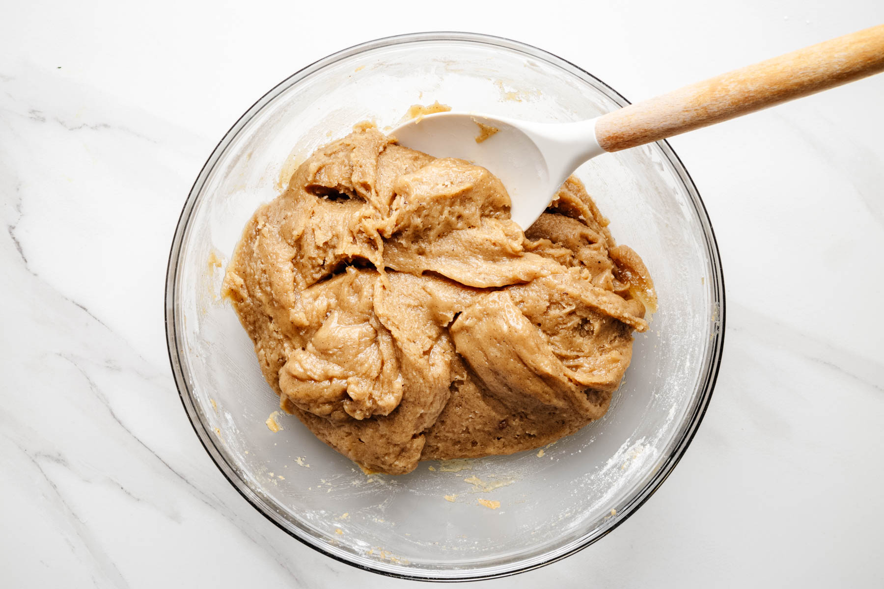 Thick blondie batter mixed until the flour is fully incorporated.