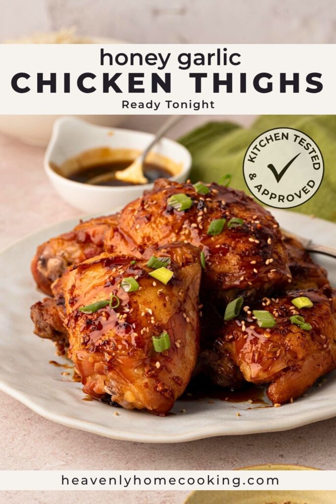 A vertical Pinterest pin featuring glossy honey garlic chicken thighs served on a white plate. The text overlay reads "Honey Garlic Chicken Thighs – Ready Tonight." This is a vertical Pinterest pin for a homemade recipe from Heavenly Home Cooking.