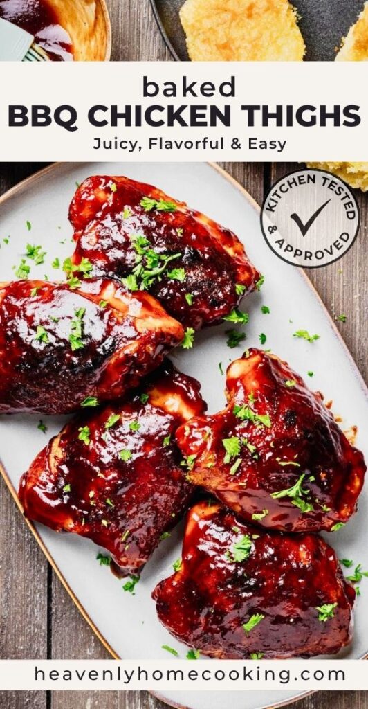 Five glossy baked BBQ chicken thighs coated in rich barbecue sauce on a serving platter with cornbread and a barbecue sauce brush nearby. A vertical Pinterest pin for a homemade baked BBQ chicken thighs recipe from Heavenly Home Cooking.