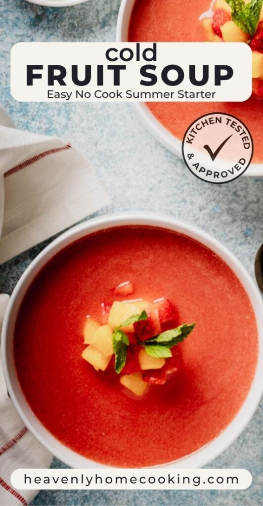 Overhead view of cold fruit soup garnished with diced peaches, strawberries, and mint. Text reads “Cold Fruit Soup: Easy No-Cook Summer Starter.” This is a vertical Pinterest pin for a homemade recipe from Heavenly Home Cooking.