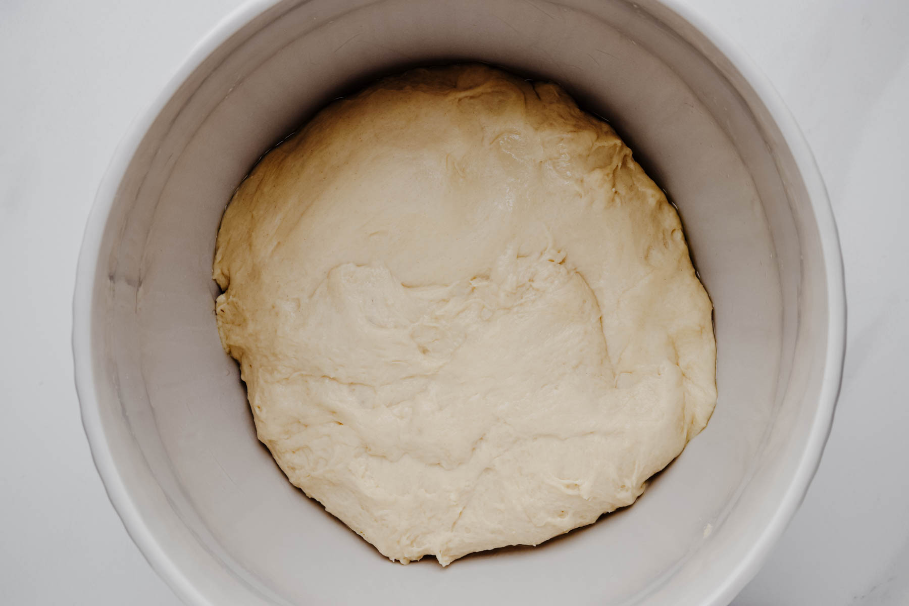 Garlic dinner roll dough ready for the first rise.