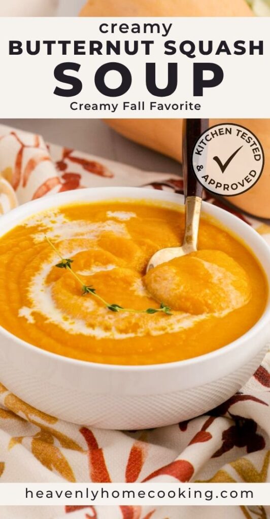 Creamy butternut squash soup garnished with a swirl of cream and fresh thyme in a white bowl. The Pinterest pin reads "Creamy Butternut Squash Soup" with the subtitle "Creamy Fall Favorite," and includes a Kitchen Tested & Approved badge and Heavenly Home Cooking branding.