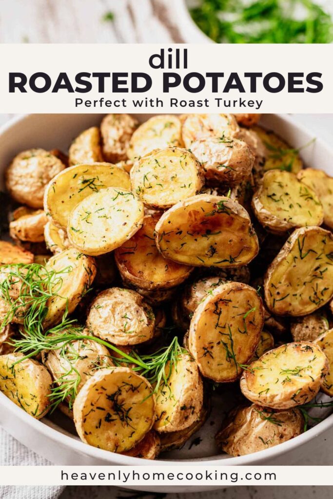 A close-up showcases golden roasted baby potatoes with crispy cut sides and plenty of fresh dill in a serving bowl. The Pinterest pin includes the text “Dill Roasted Potatoes – Perfect with Roast Turkey.” This vertical Pinterest pin features a homemade dill roasted potatoes recipe from Heavenly Home Cooking.