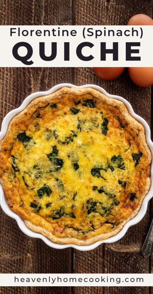 Whole quiche Florentine filled with spinach, eggs, and melted cheese in a white fluted pie dish.