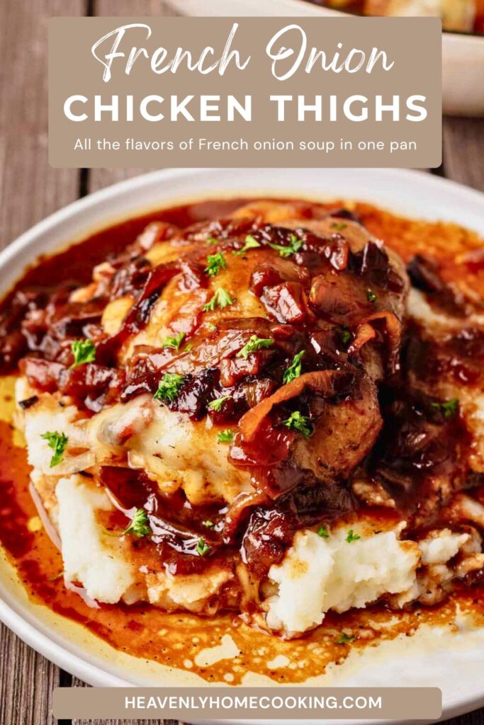 A French onion chicken thigh served over creamy mashed potatoes with caramelized onions, melted cheese, rich onion sauce, and fresh parsley. The Pinterest pin includes the text “French Onion Chicken Thighs – All the Flavors of French Onion Soup in One Pan.” This vertical Pinterest pin features a homemade French onion chicken thighs recipe from Heavenly Home Cooking.