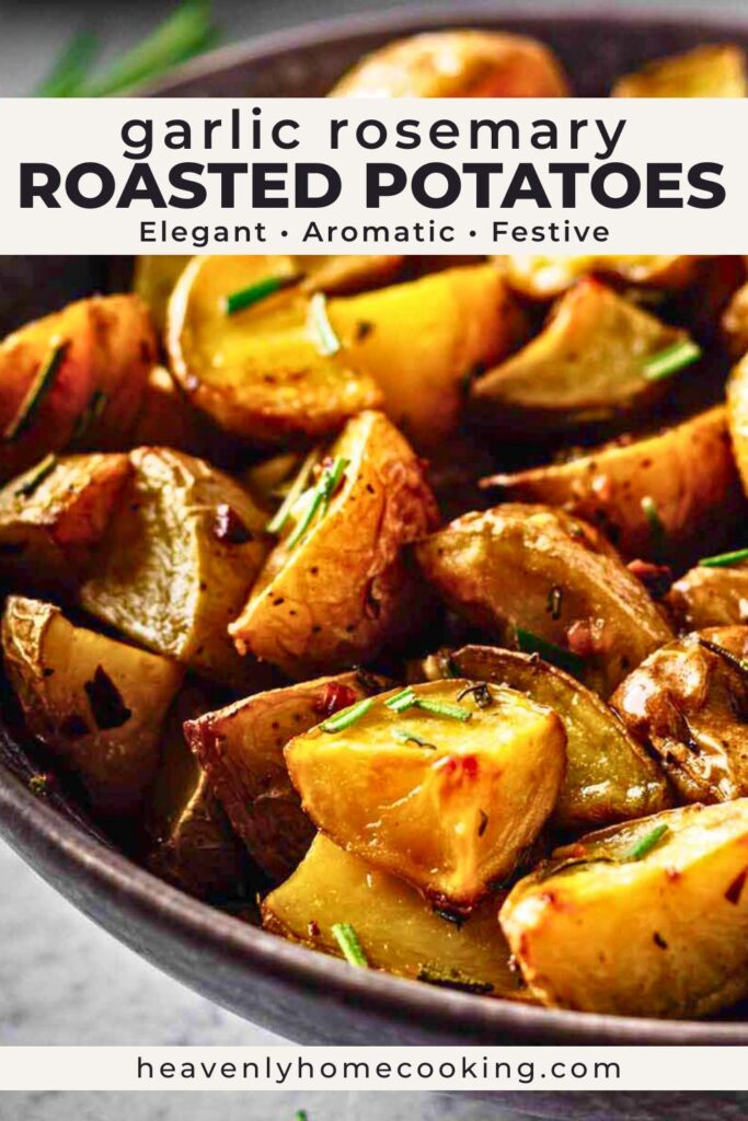 Garlic rosemary roasted potatoes from Heavenly Home Cooking served in a rustic bowl. Crispy roasted baby potatoes are tossed with fresh rosemary, garlic, and herbs for an easy holiday side dish.