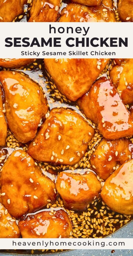 Close-up of bite-sized honey sesame chicken coated in a glossy sauce and sprinkled with sesame seeds. Pin text reads “Honey Sesame Chicken – Sticky Sesame Skillet Chicken” with Heavenly Home Cooking branding.