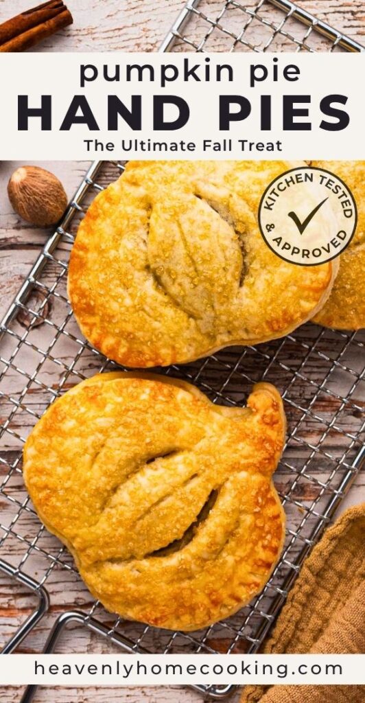 Pinterest pin for pumpkin pie hand pies featuring two golden, flaky hand pies on a cooling rack with warm fall spices in the background. The text overlay reads "Pumpkin Pie Hand Pies – The Ultimate Fall Treat." Includes a Kitchen Tested & Approved badge and Heavenly Home Cooking branding.
