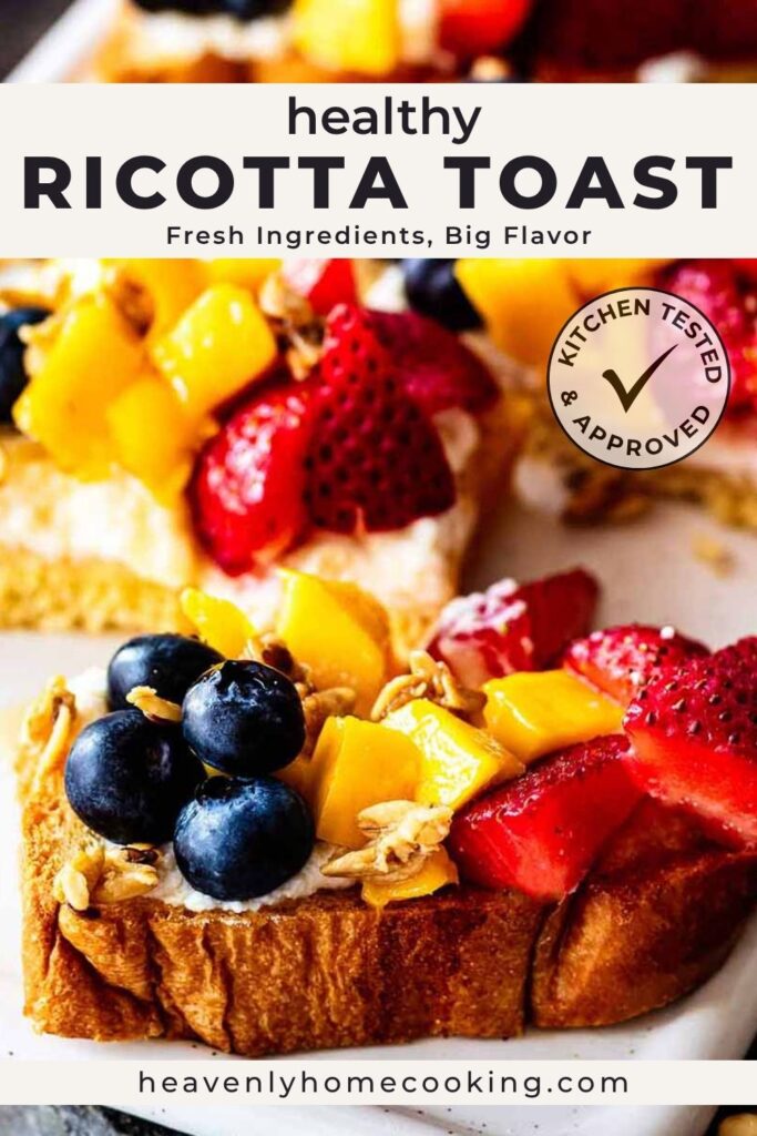 Healthy ricotta toast topped with strawberries, blueberries, mango, granola, and honey, from Heavenly Home Cooking.