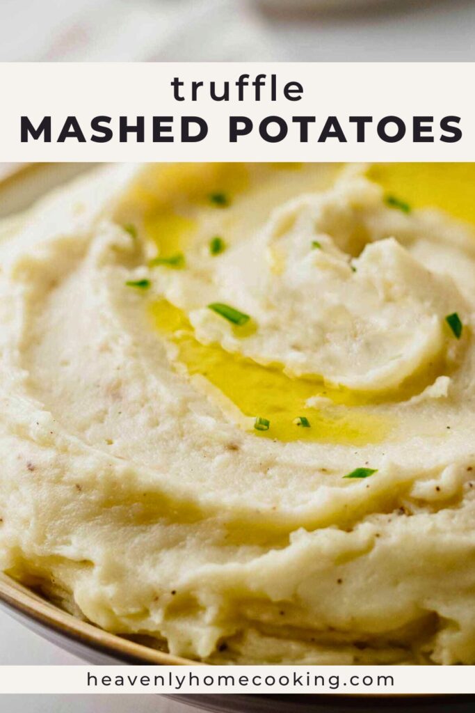 Creamy truffle mashed potatoes topped with melted butter and chopped fresh chives in a serving bowl.